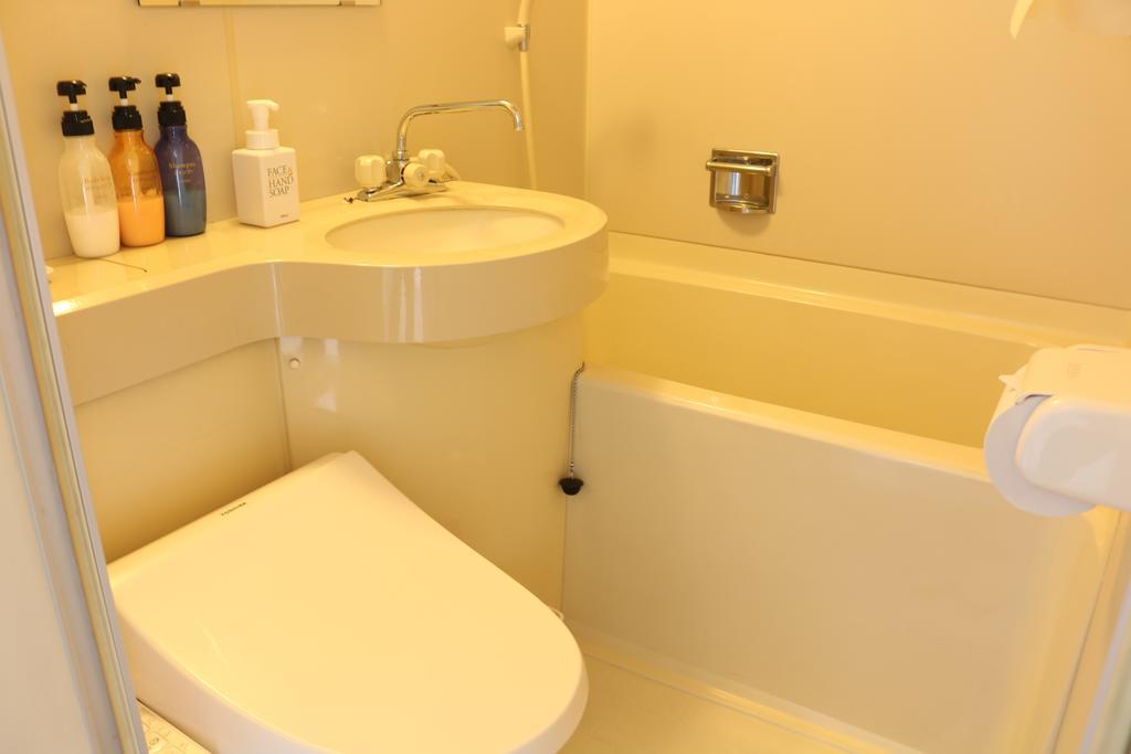 Hotel Sankeien Sapporo Habitación foto
