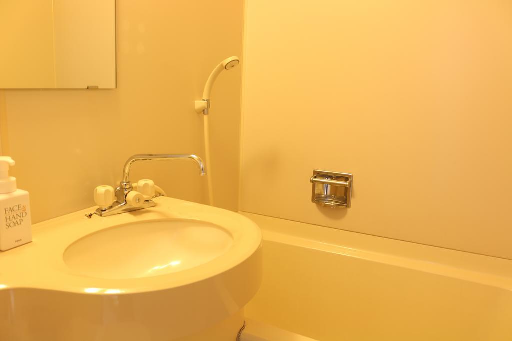Hotel Sankeien Sapporo Habitación foto